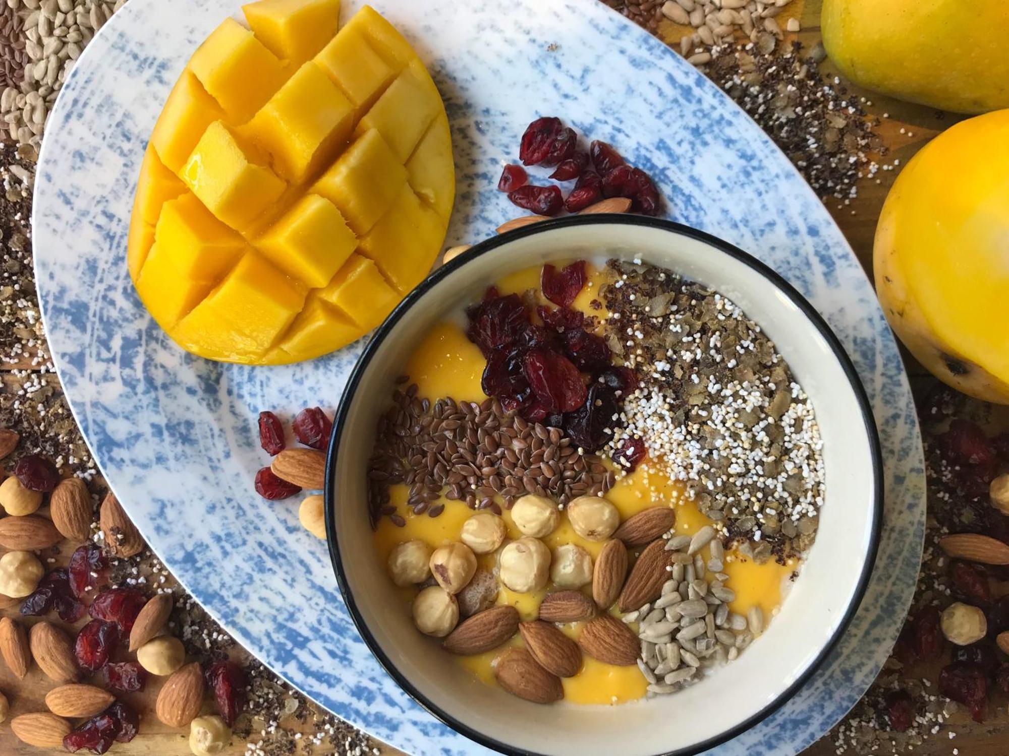 Andaz Delhi, By Hyatt Hotel New Delhi Room photo A smoothie bowl with mango, nuts, and seeds